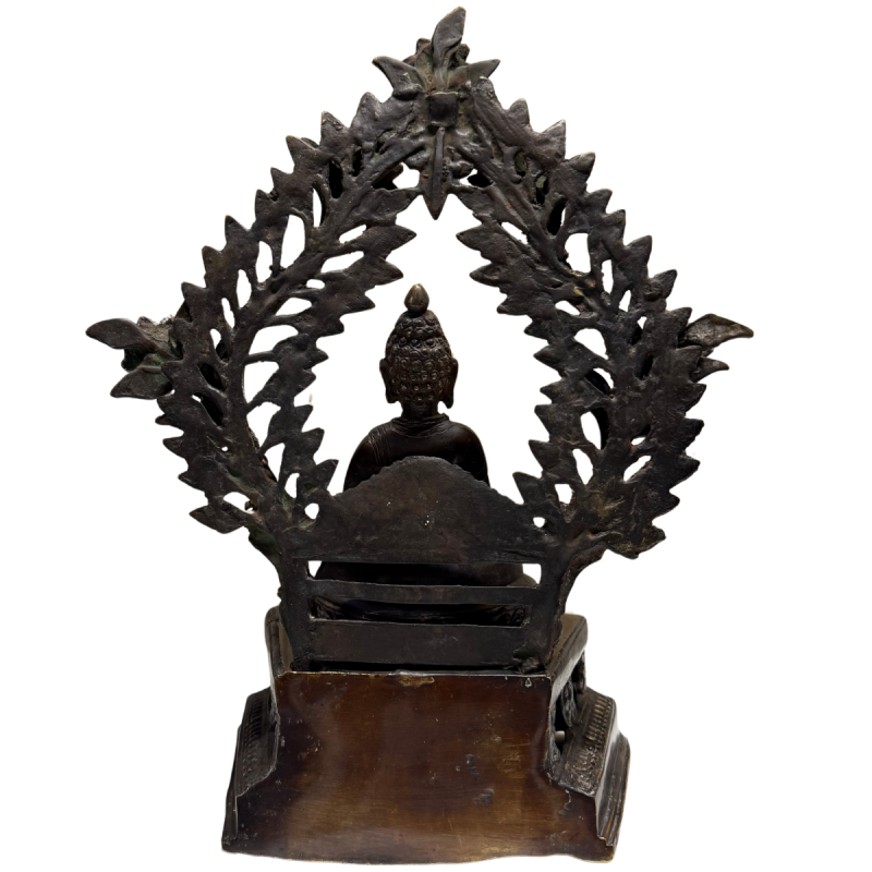 Antique Himalayan temple statue of a fire-gilded Buddha