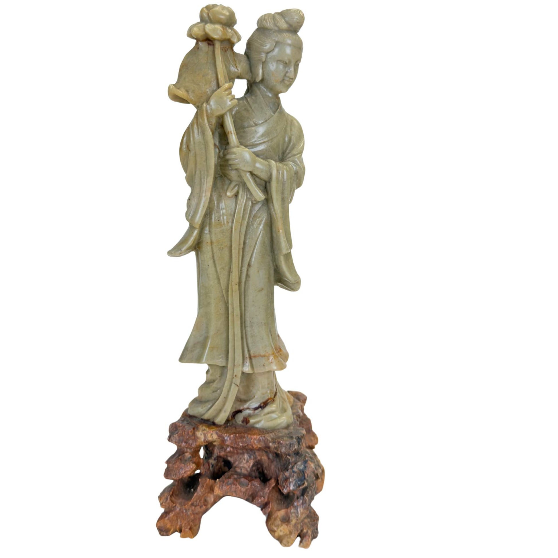 Front view of an antique 18th-century wooden temple panel depicting the goddess Lakshmi from South India.