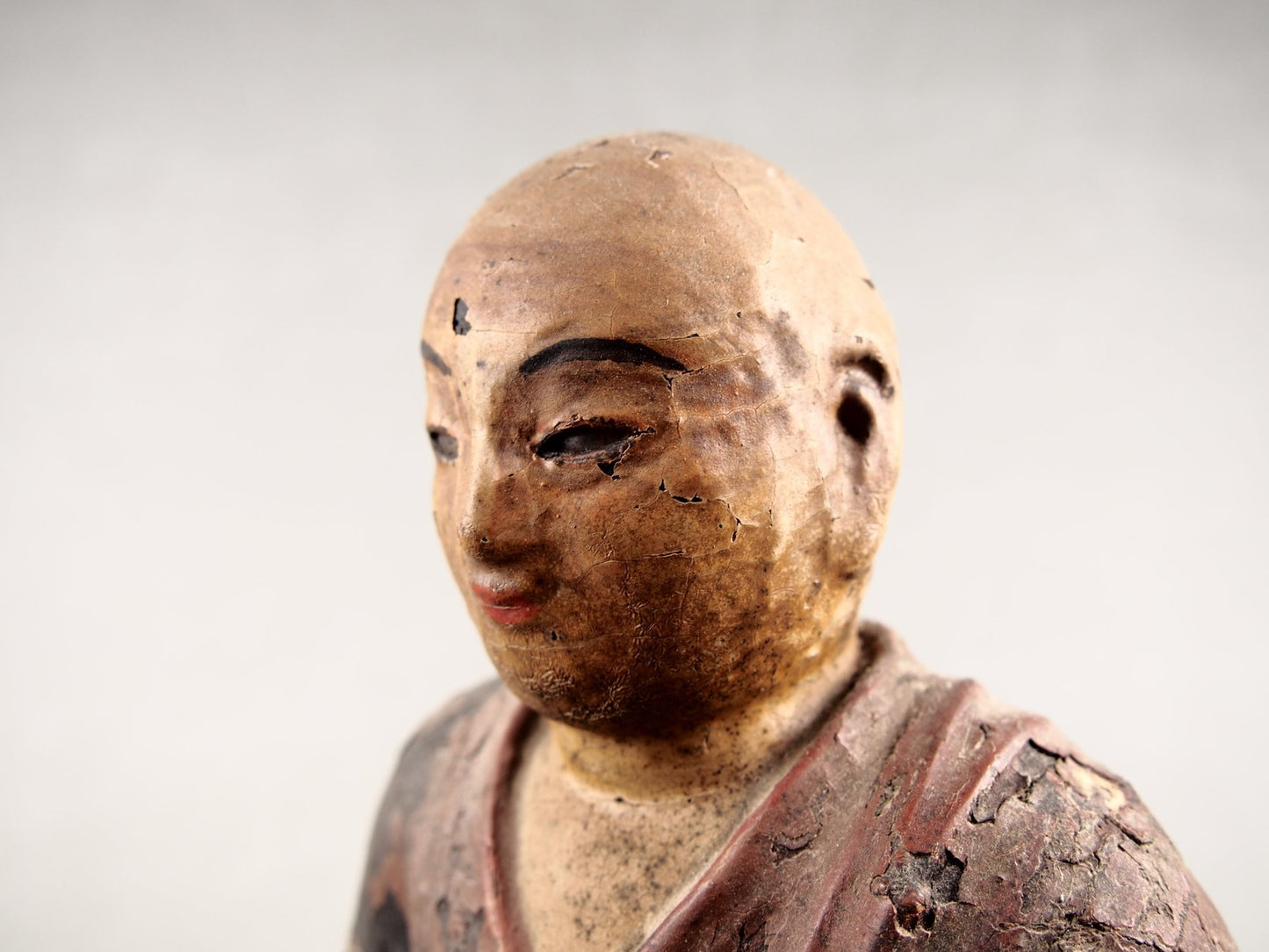 Antique Japanese statue from Buddhist tradition
