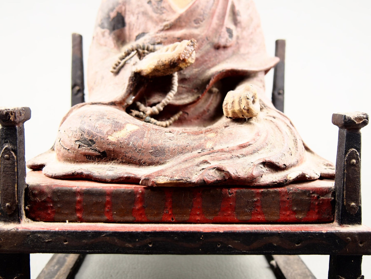 Antique religious statue from the Japanese Buddhist tradition
