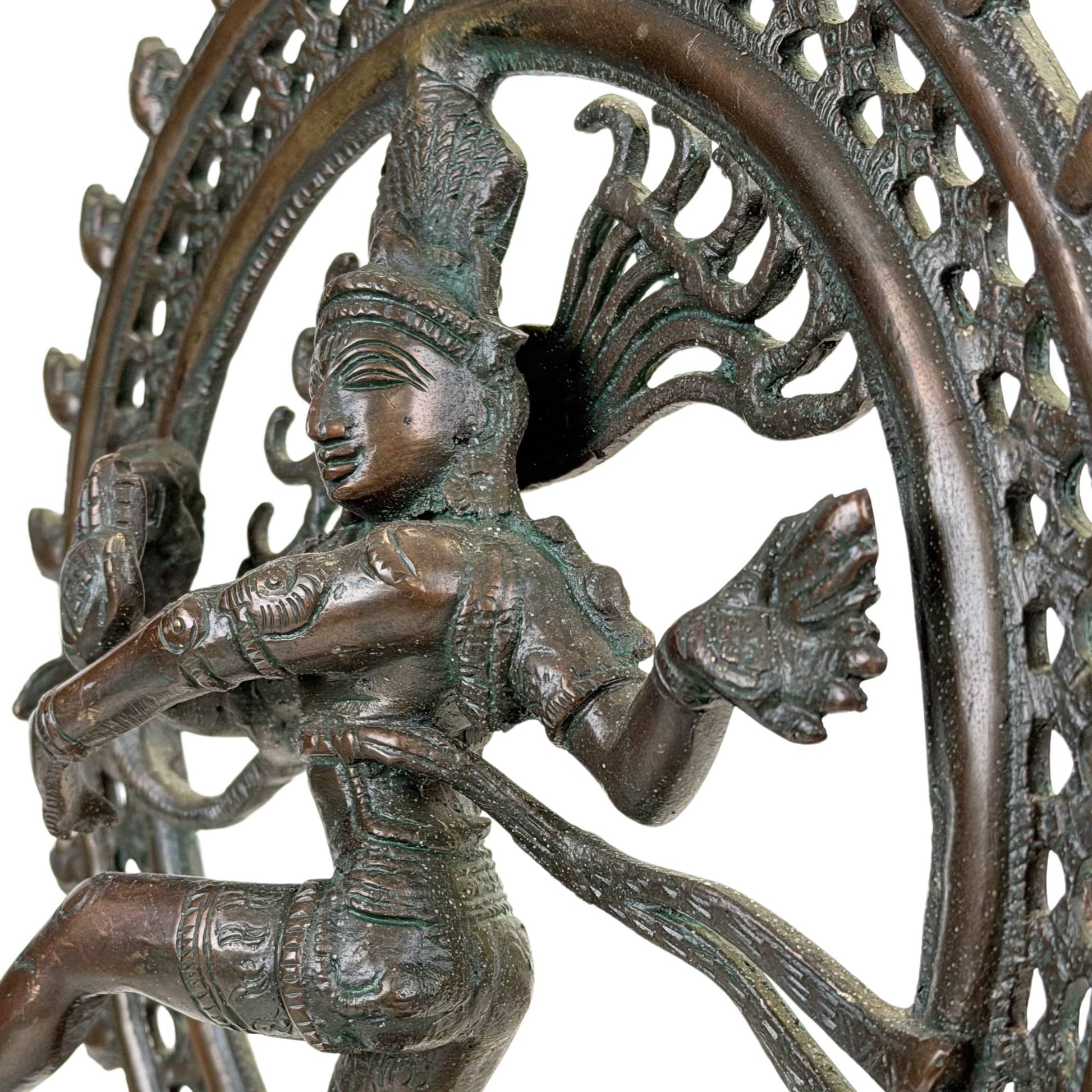 Antique Nataraja statue with dancing Shiva, richly decorated halo and deep green oxidation