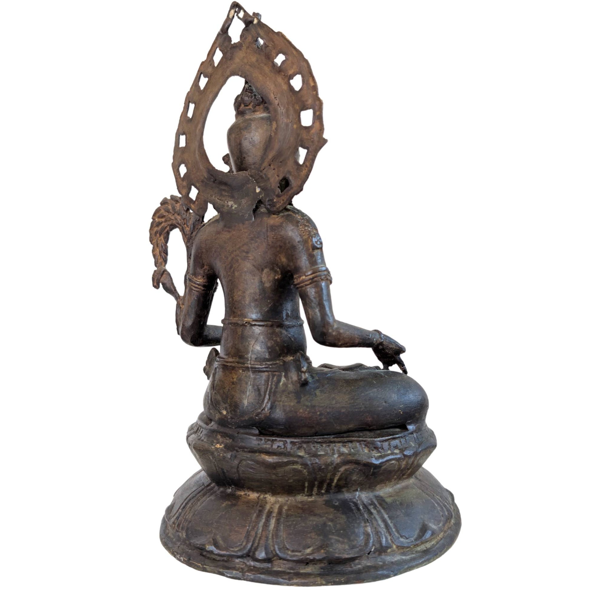 Old ritual bronze statue with natural oxidation and wear