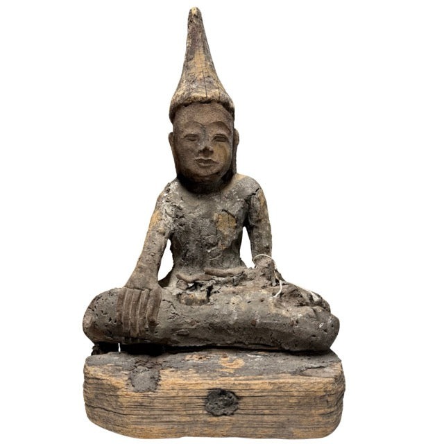 Antique wooden Shan Buddha statue from Myanmar as a symbol of grounding and enlightenment