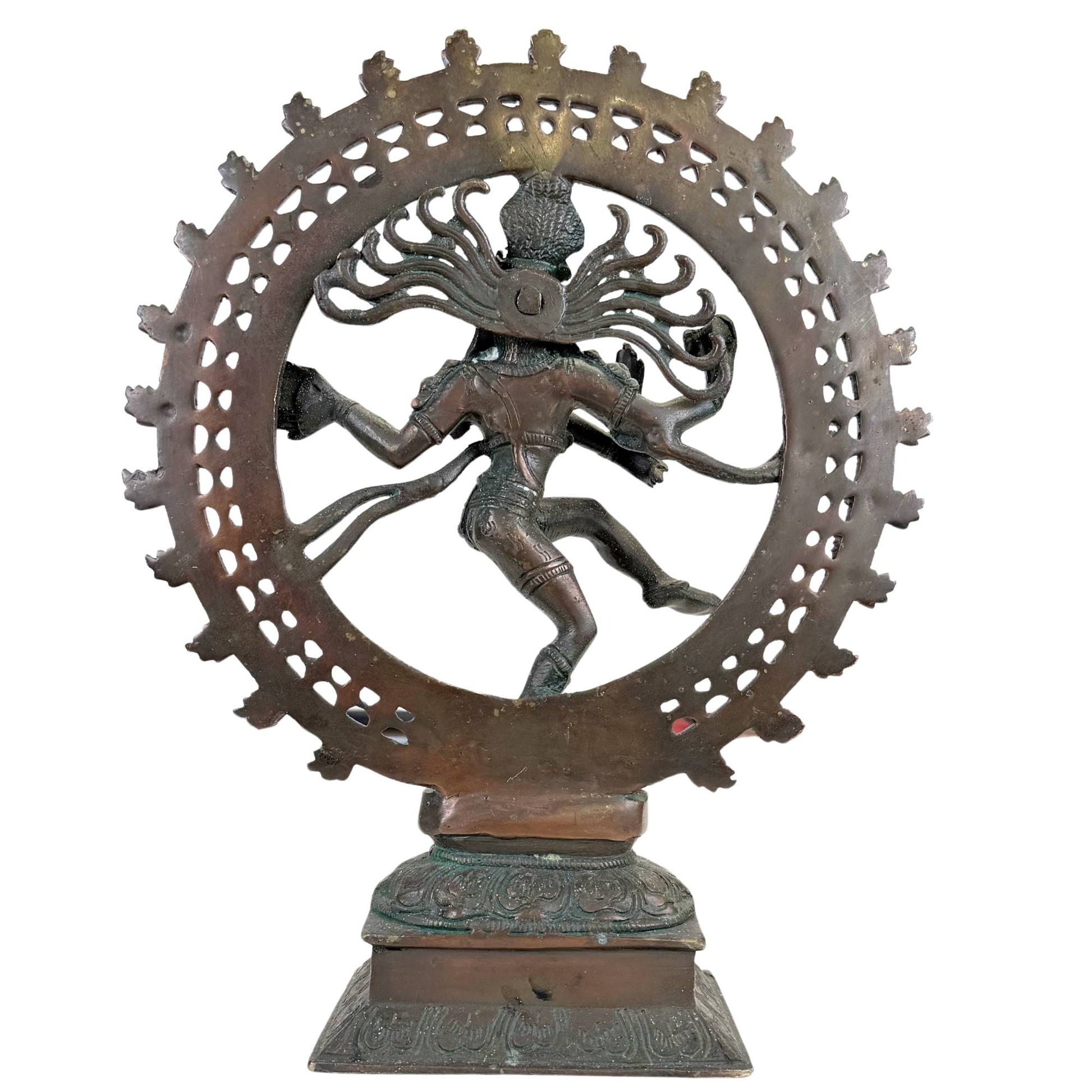 Antique bronze Shiva statue with ritual green oxidation, openwork fire ring, and classical Nataraja iconography