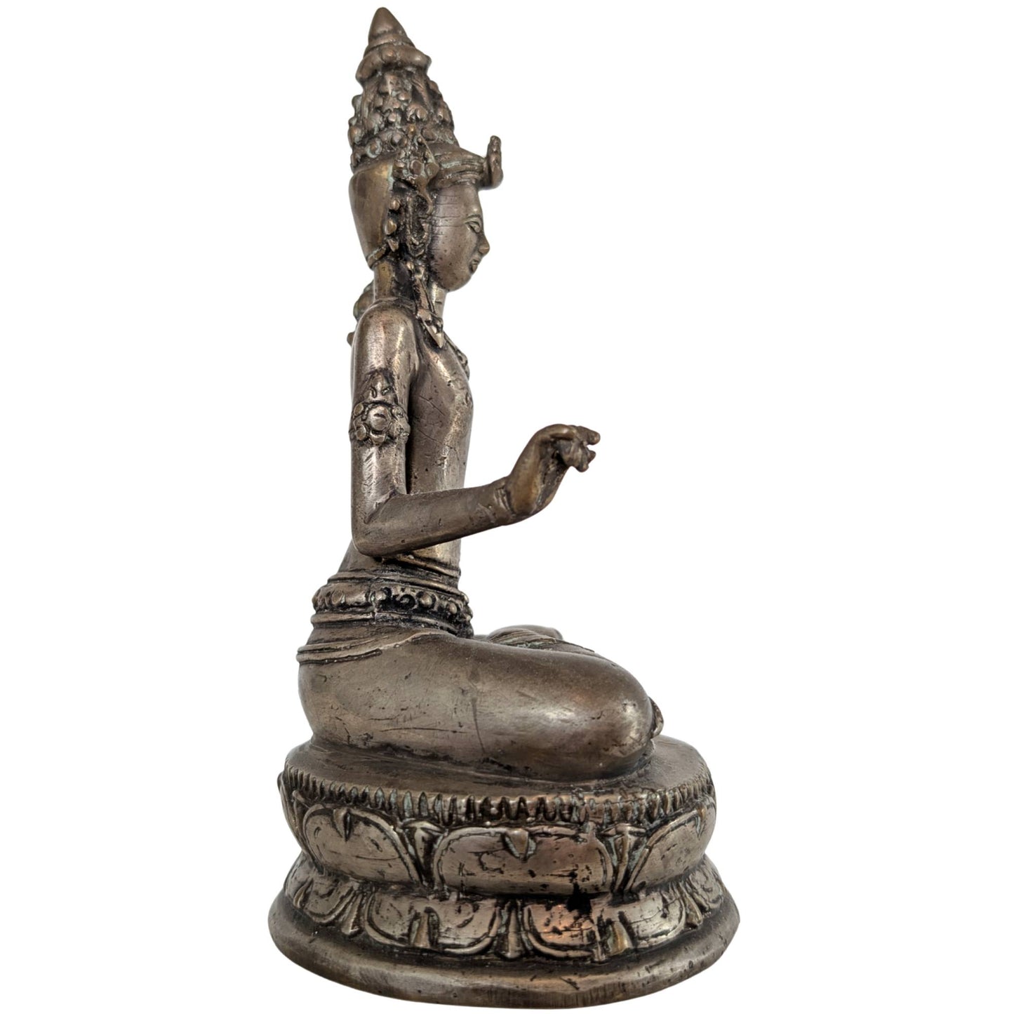 The side view emphasizes the delicate lotus stem growing along the bodhisattva's arm.