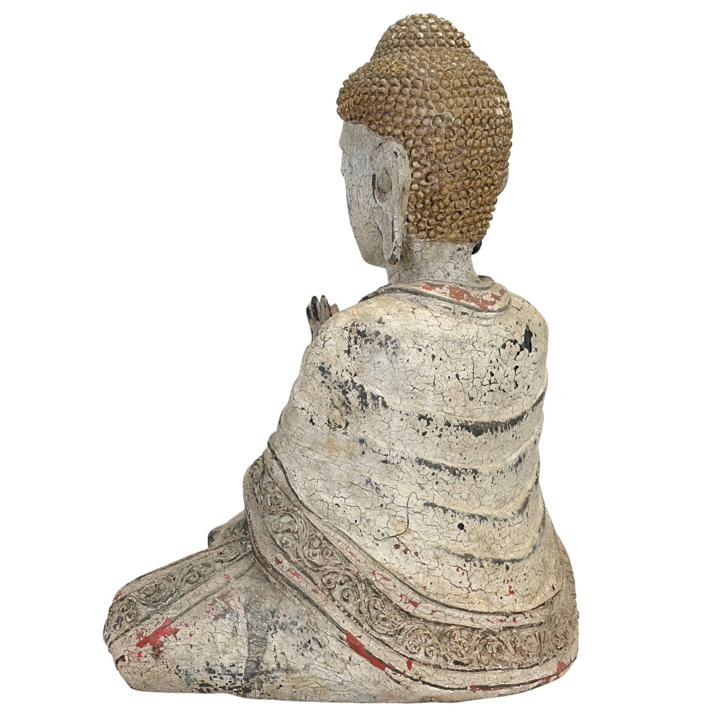 Détail de la tête du Bouddha montrant l'érosion asymétrique des protubérances crâniennes (ushnisha) et des vestiges de la couronne royale.