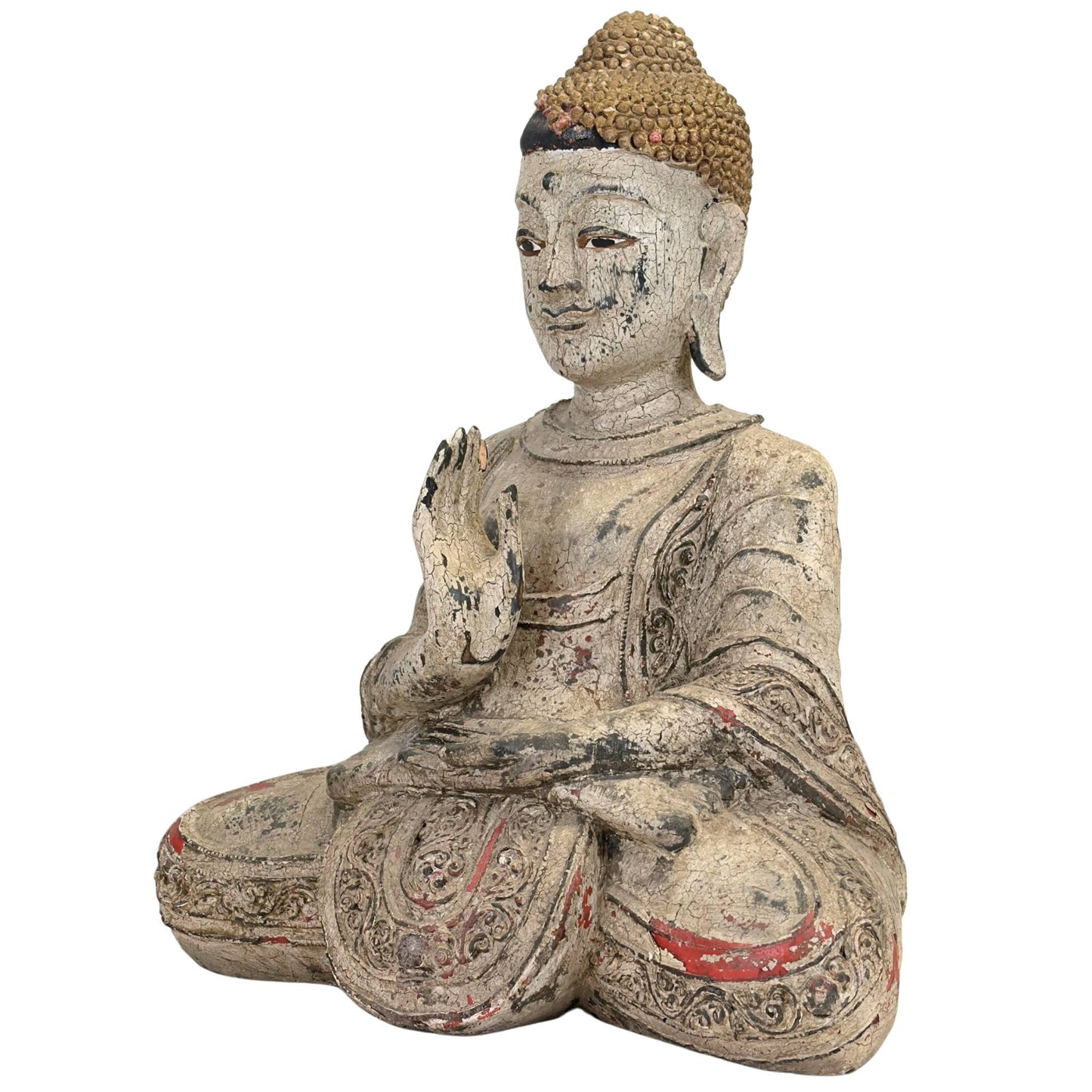 Détail de la main droite élégamment levée dans le Vitarka mudra de l'enseignement et de la discussion spirituelle