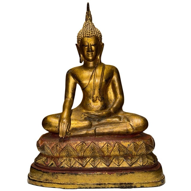 Antique Thai Rattanakosin Buddha statue of heavy bronze with old gilding and a spiritual aura