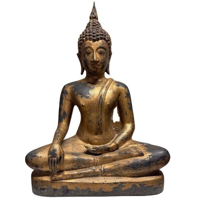 Antique Thai Buddha statue in bronze with remnants of gilding