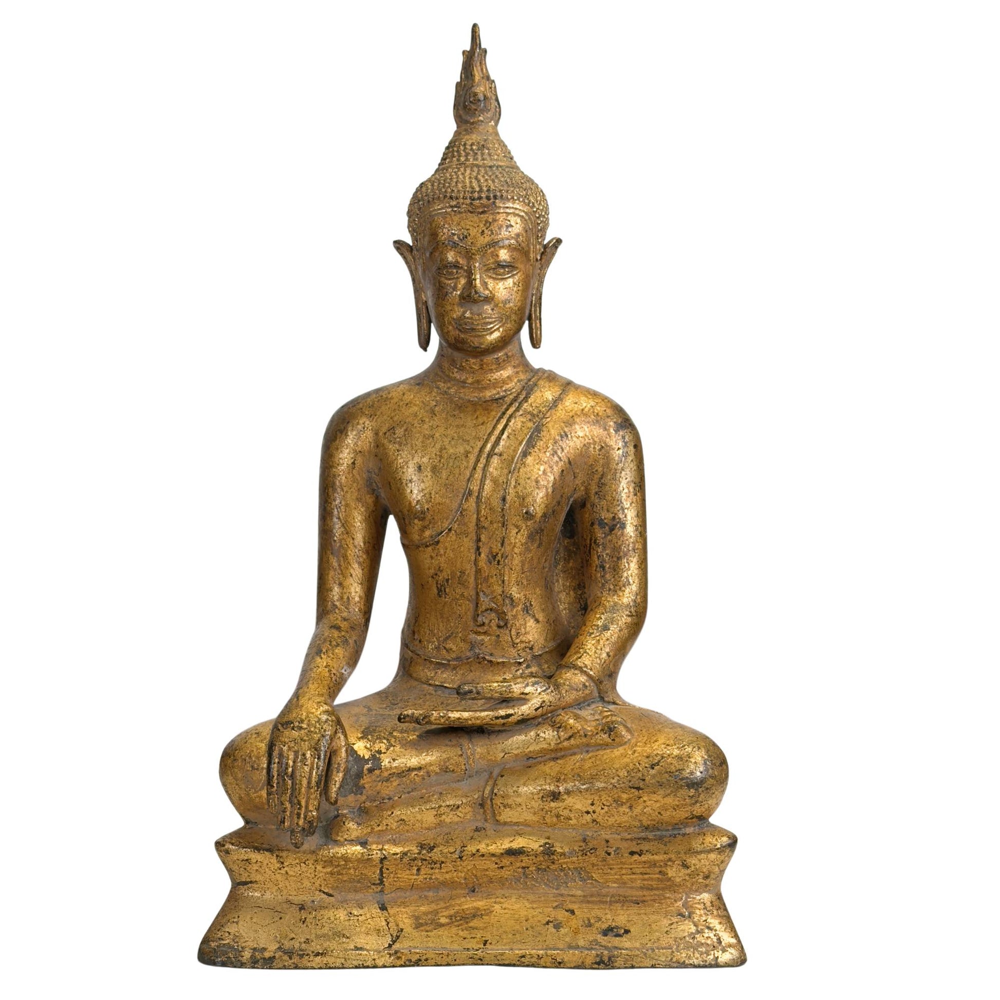 Antique Thai Buddha statue in Bhumisparsha Mudra prayer posture