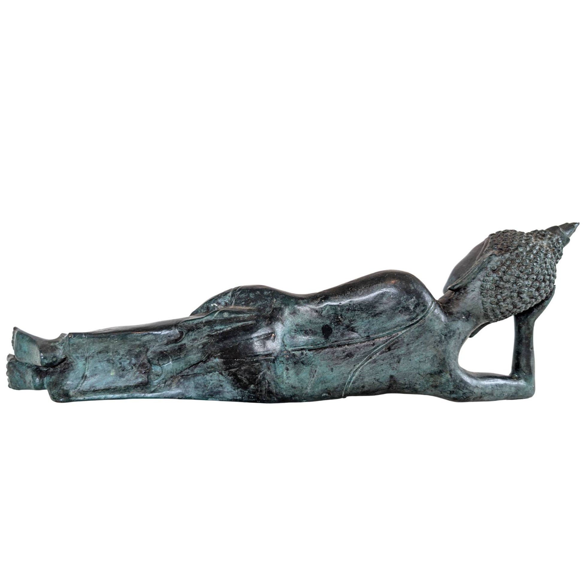 Antique Thai Buddha statue in a reclining position with authentic blue-green patina