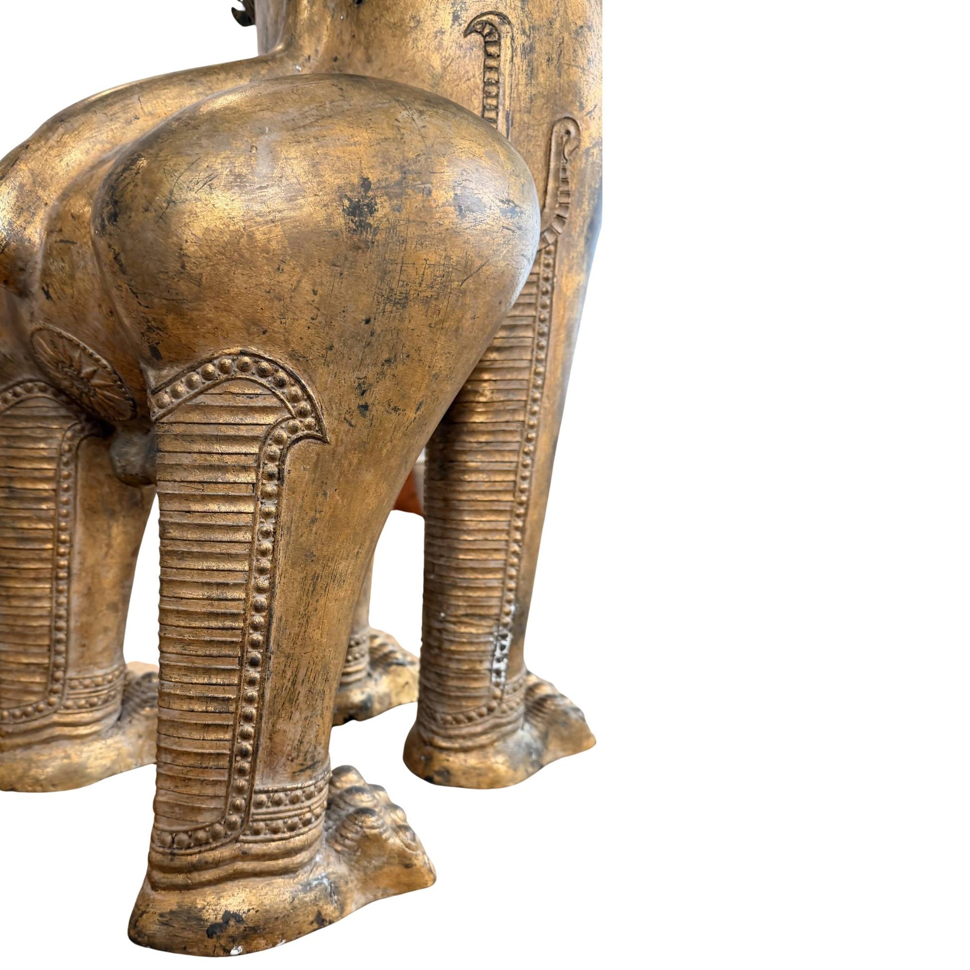 Antique Thai guardian statue of a Singha lion, richly gilded and made for Buddhist temple protection
