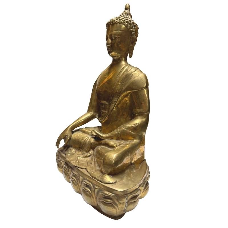 Antique Tibetan Buddha statue of fire-gilded metal
