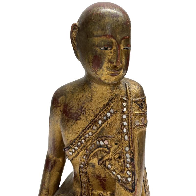 Gilded Burmese monk statue, 26 cm high, with a red lacquer base and patina.