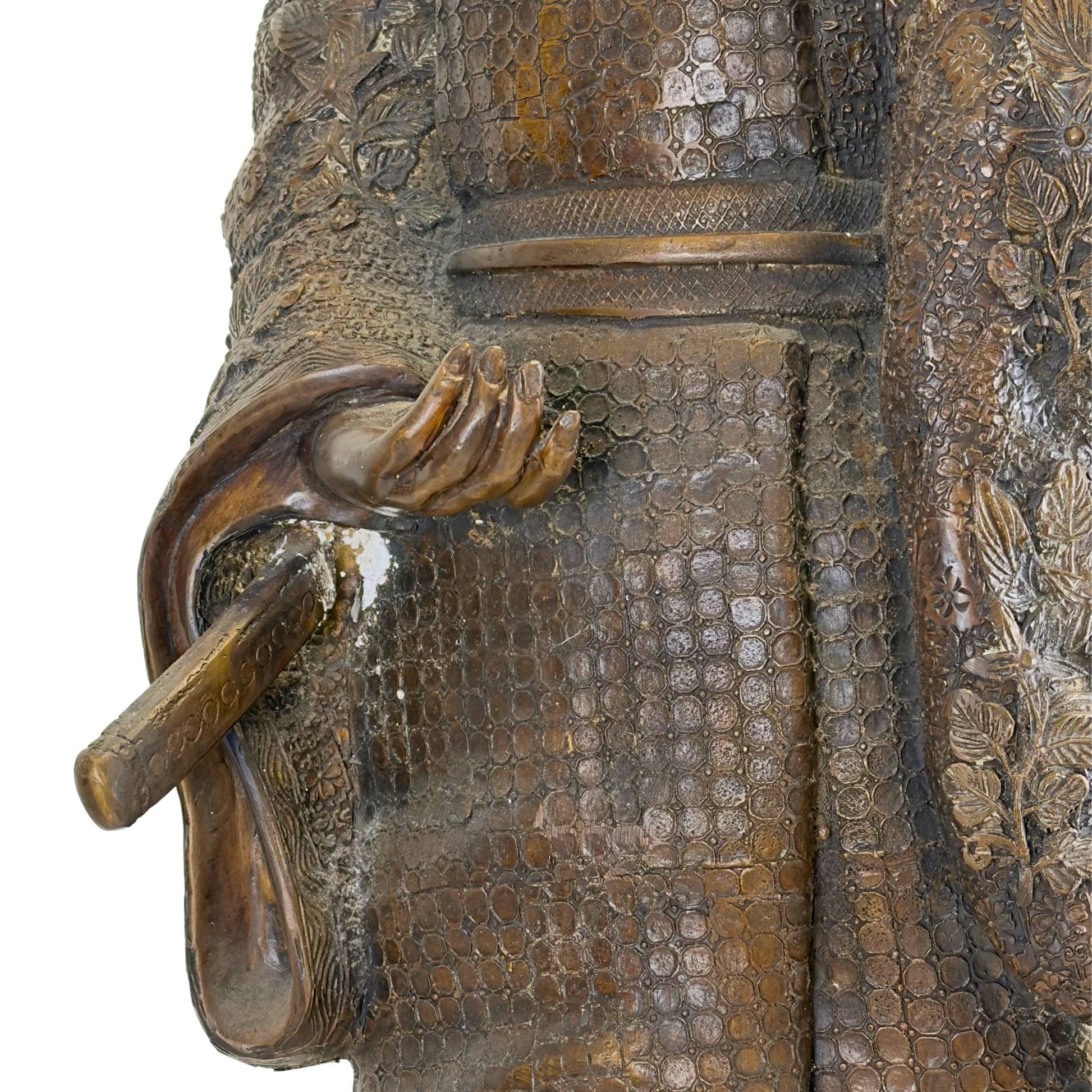 Macro shot of the back of the image where the left hand is folded open behind the back.