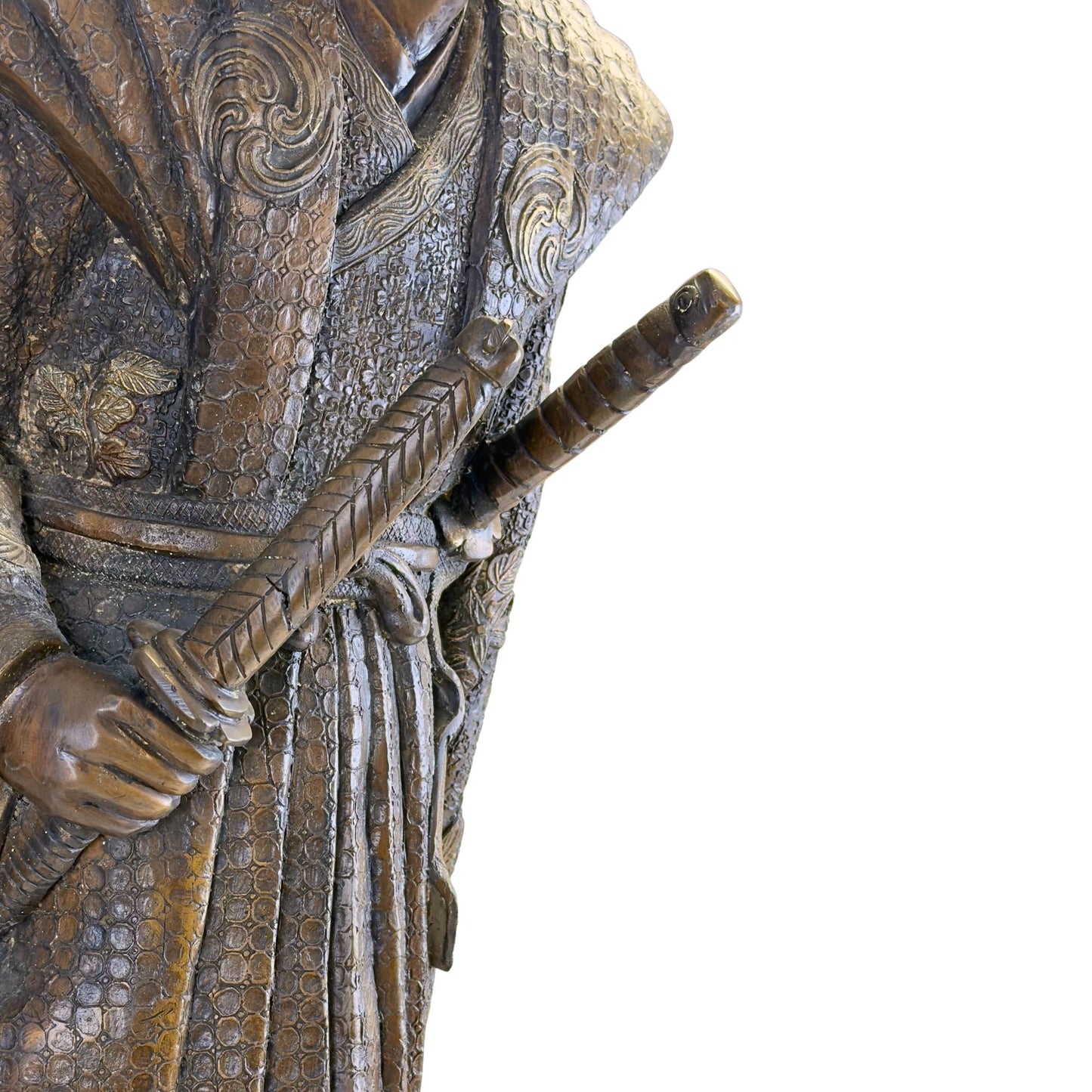 Close-up of the shoulder piece with a hand-chiseled relief pattern and the traditional Tomoe family coat of arms.