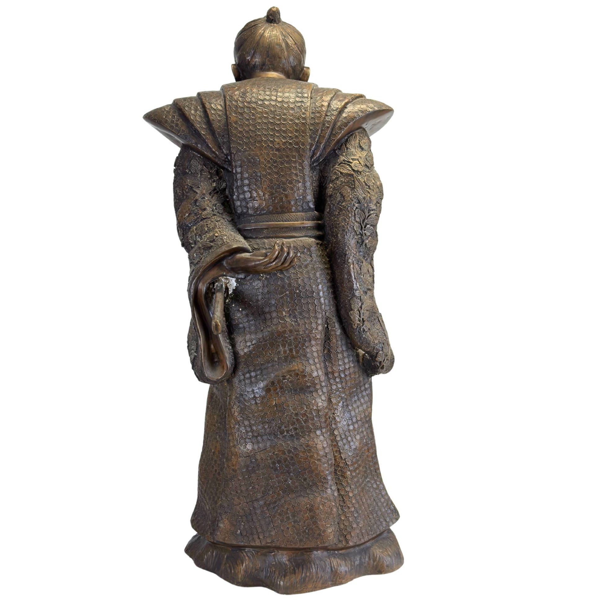 Full rear view of the solid bronze Samurai statue with the deep chestnut brown patina.
