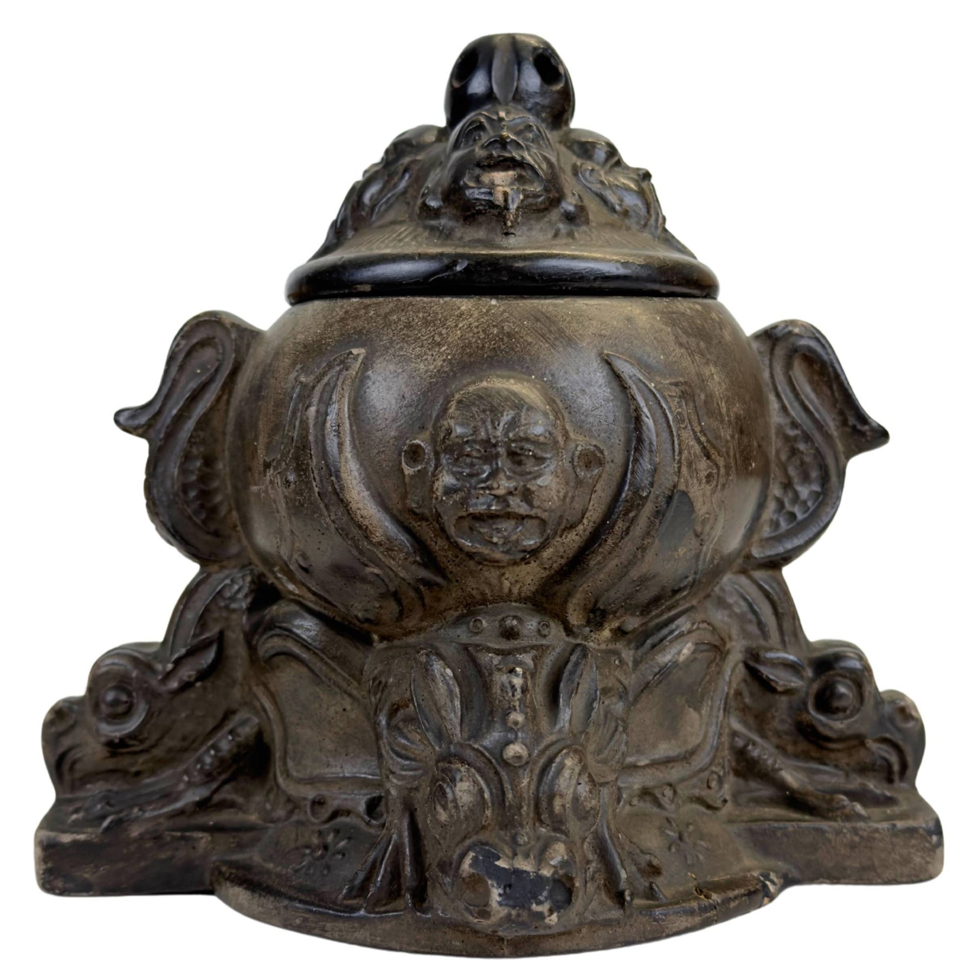 Antique Belgian dragon pot with original lid and mask decoration