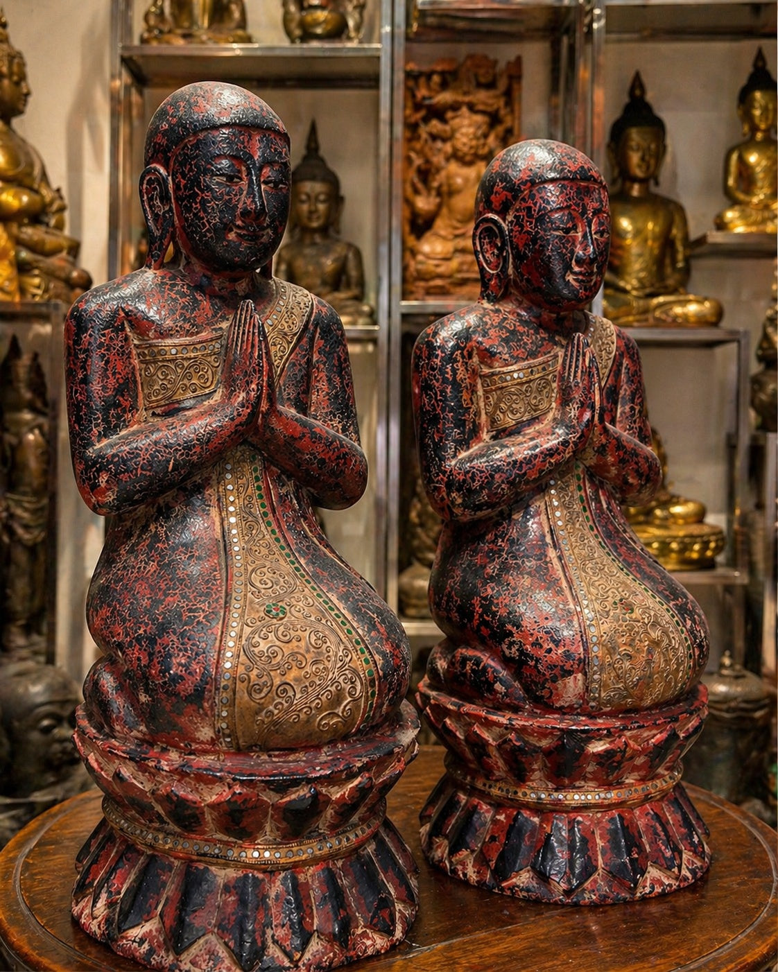 A pair of antique Burmese monks with original gallery documentation from the 1970s.