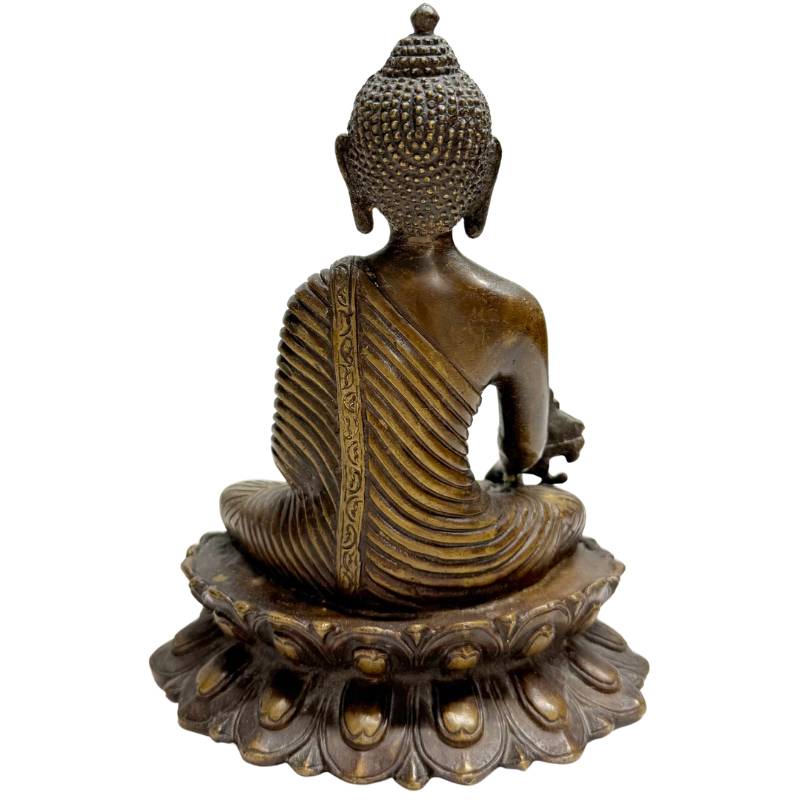 Antique bronze Buddha sculpture with lotus base
