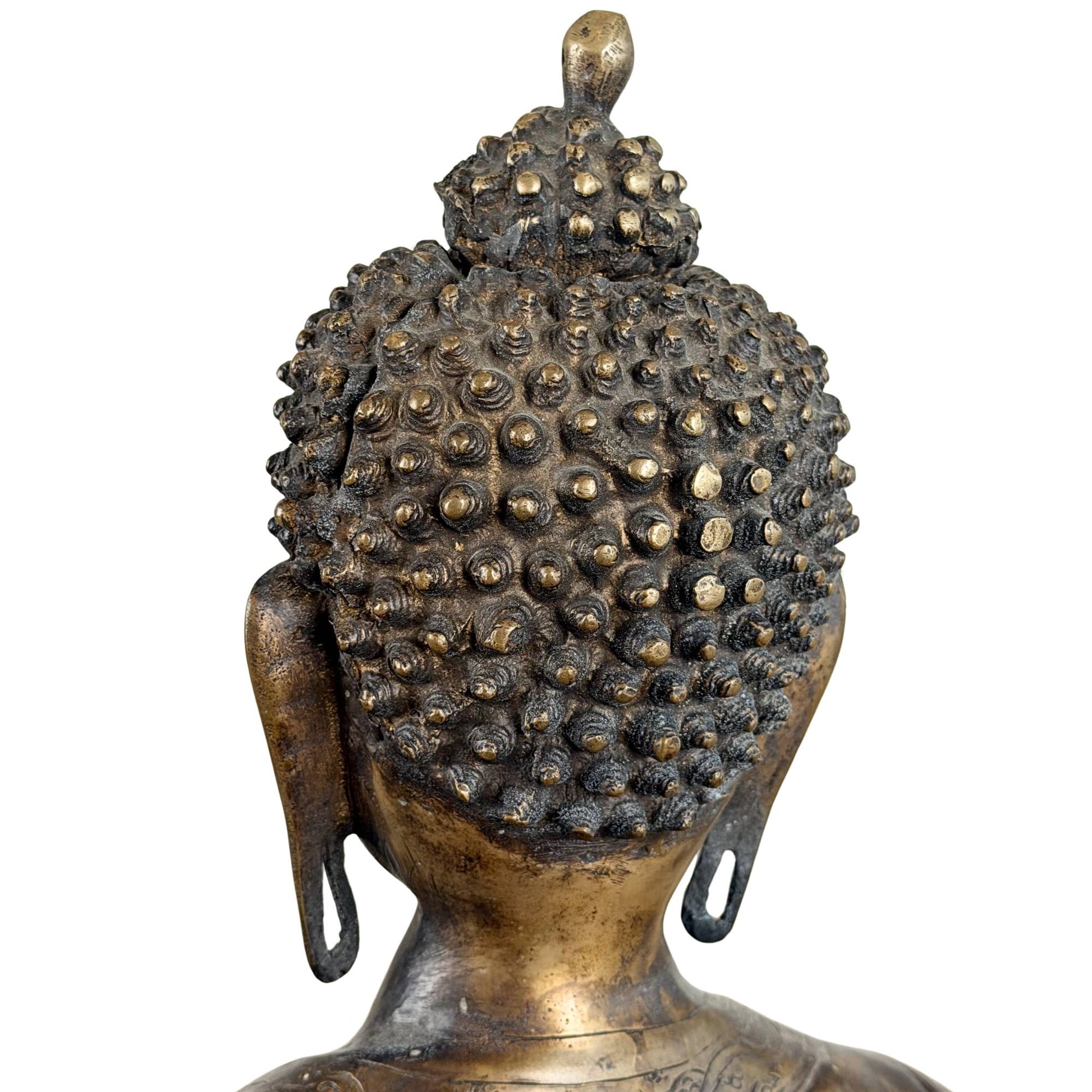 Antique bronze Buddha for a spiritual interior, meditation room, or altar with old fire gilding and a peaceful appearance.