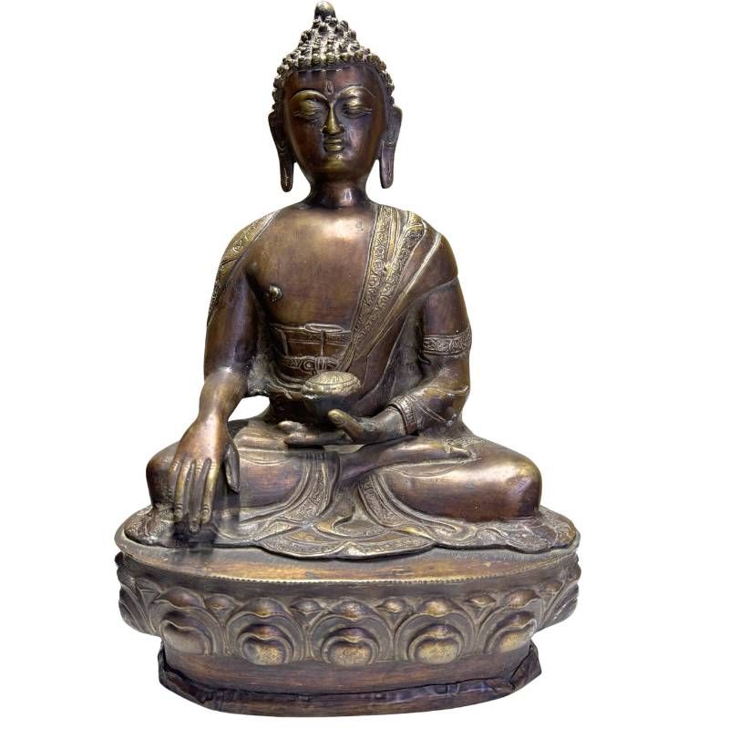 Antique bronze Medicine Buddha from the Himalayan tradition on a lotus base
