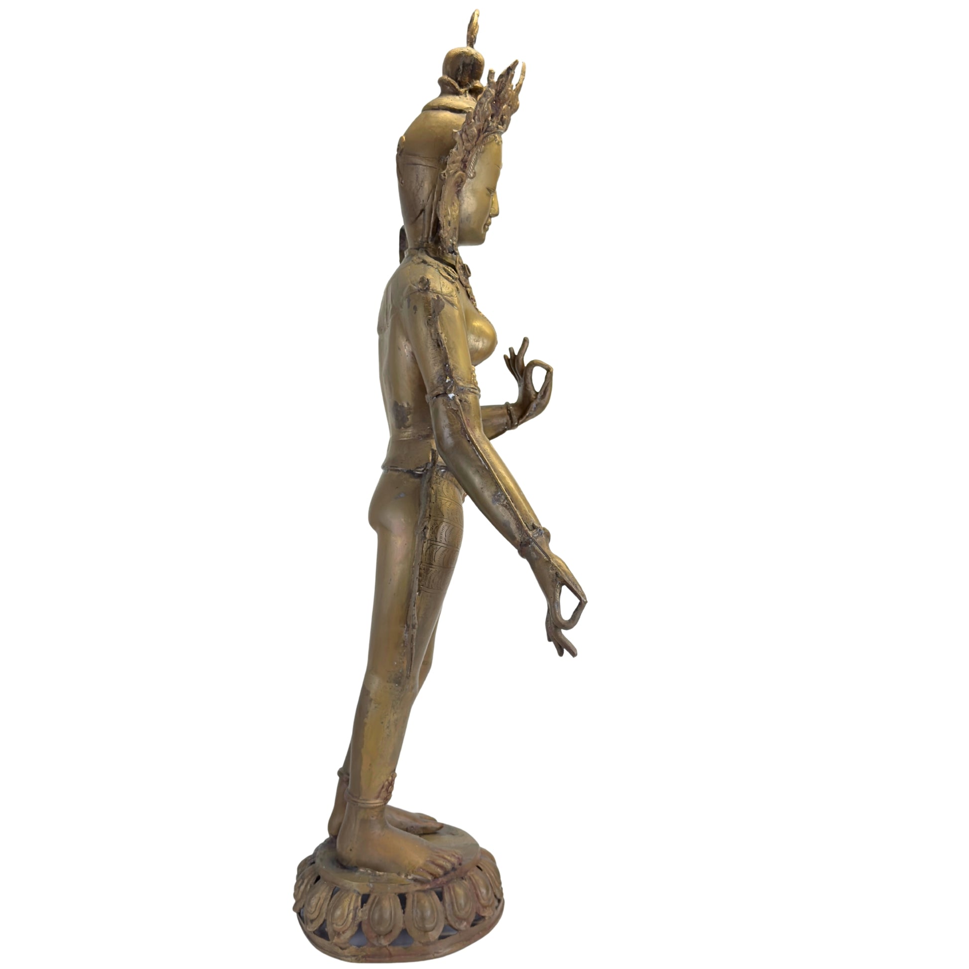 Detail van het rechter zijprofiel van een antieke Groene Tara uit Nepal met natuurlijke ouderdomssporen.