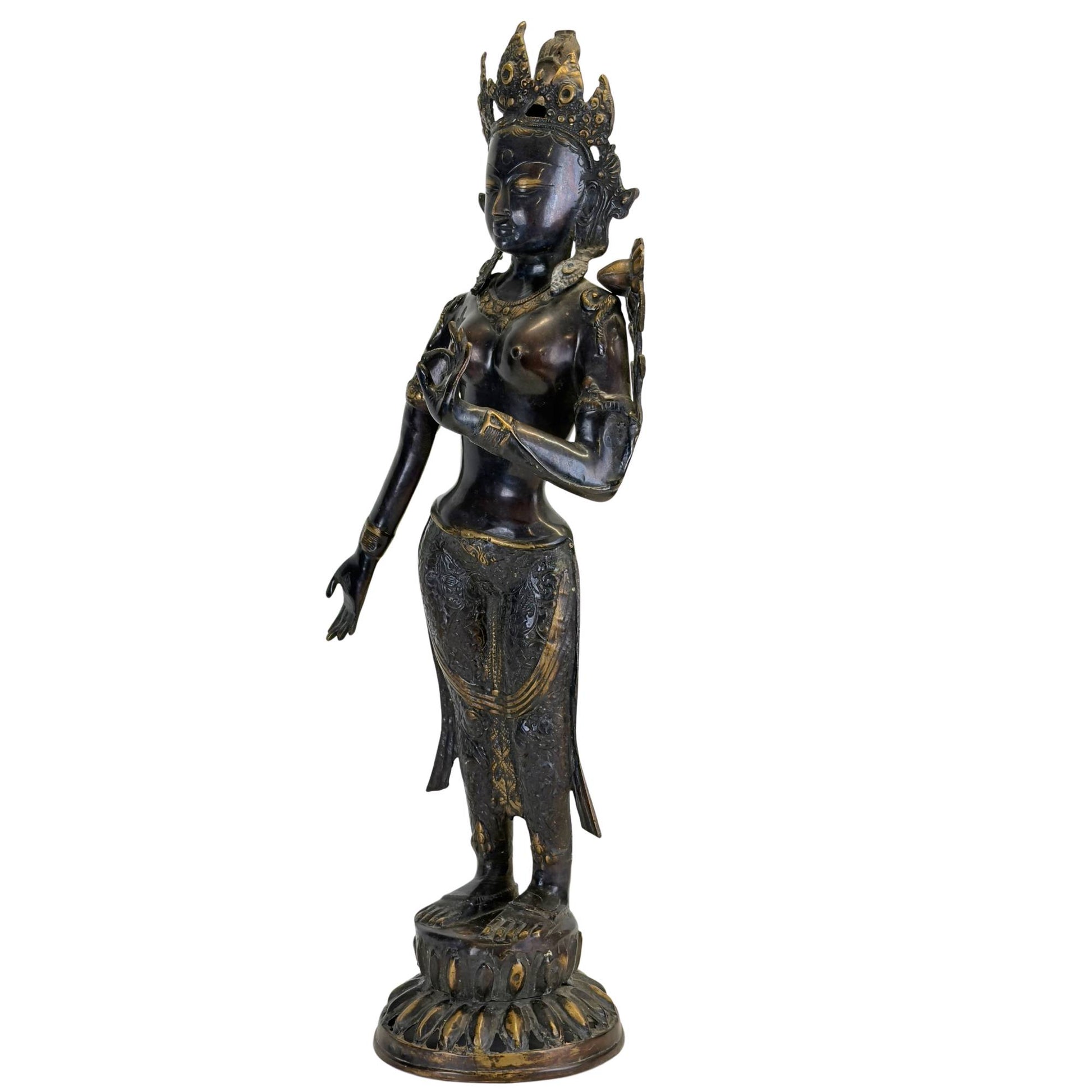 Antique bronze Green Tara from the Kathmandu Valley, Nepal, angled front right with original fire gilding, black Newar patina, and traditional lost-wax casting.