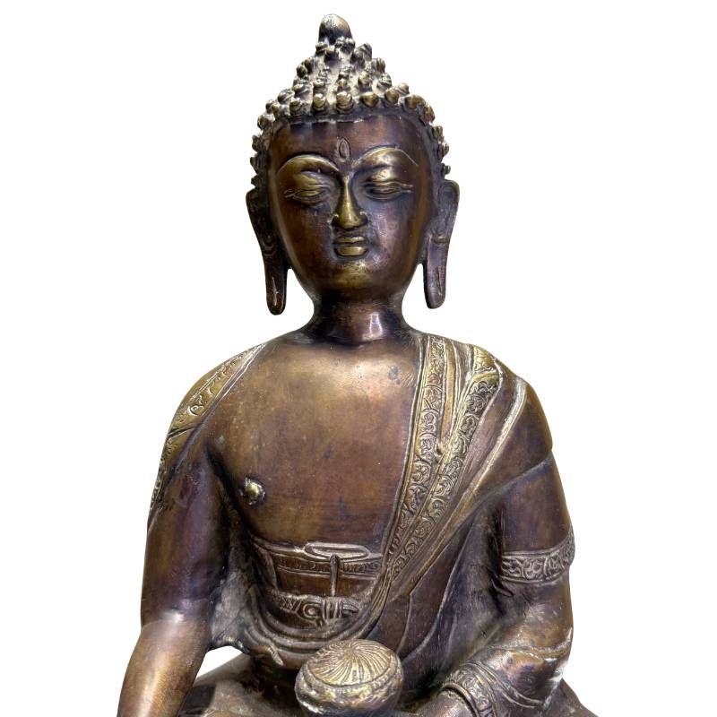 Seated antique bronze Buddha from the Himalayas with a harmonious form