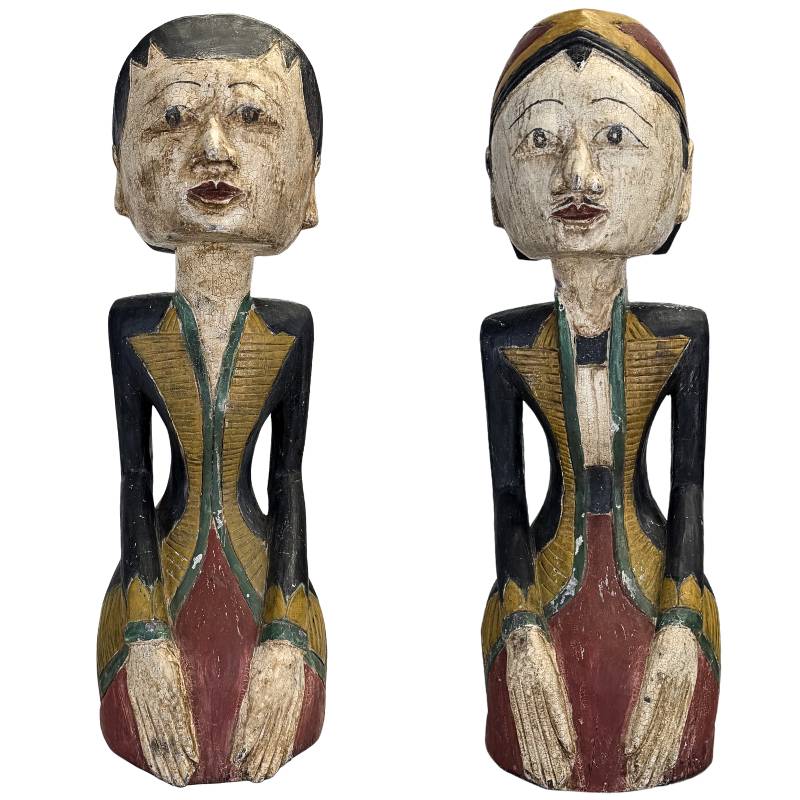 Antique Javanese Loro Blonyo statues of solid teak wood, ca. 1930.