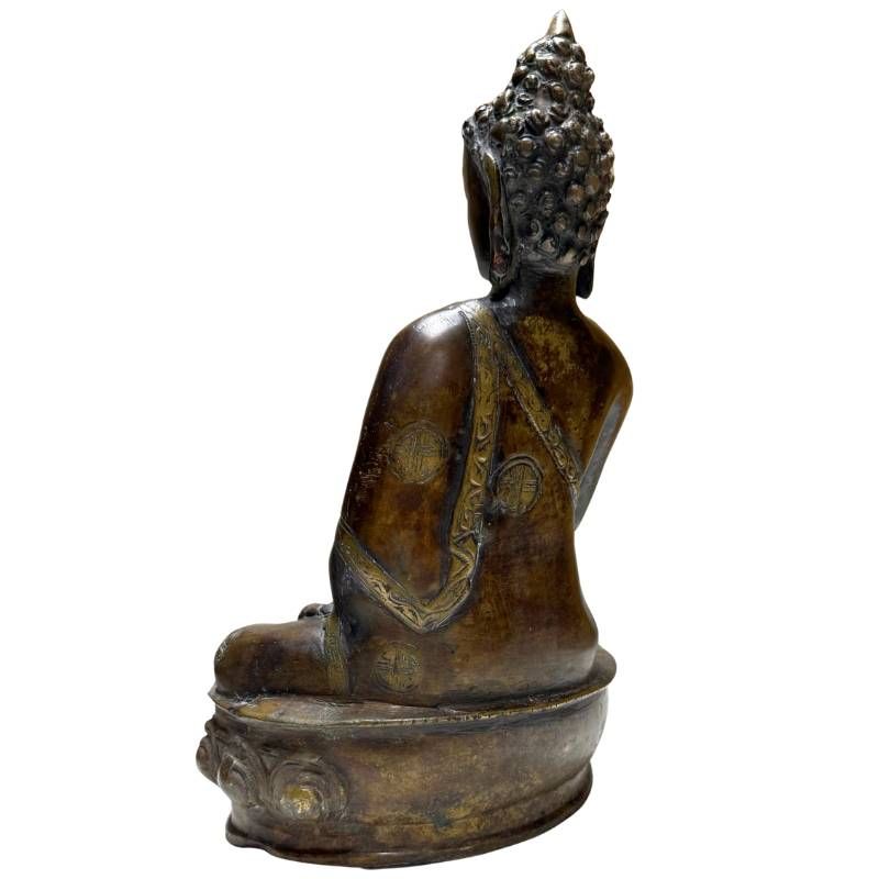 Seated antique Nepalese Buddha of bronze with a harmonious form