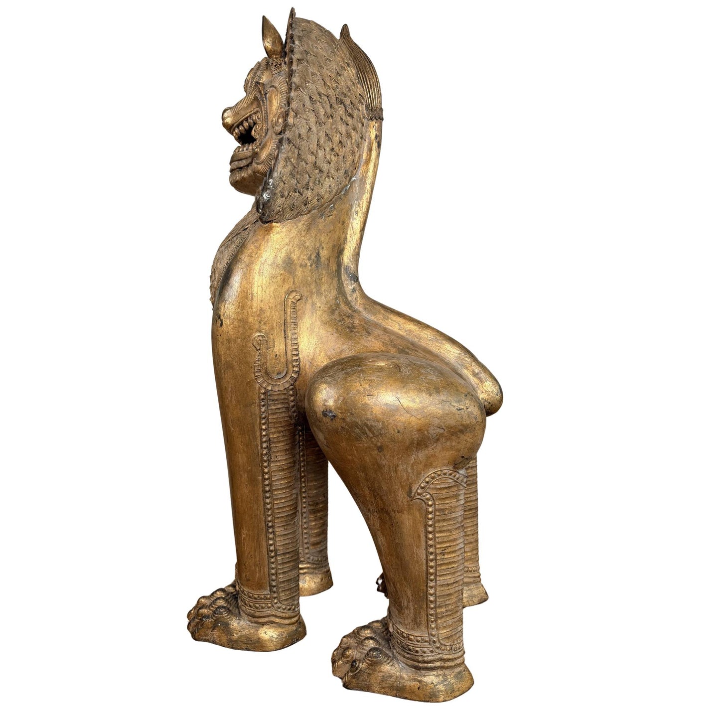 Antique Singha lion from the temple art of Thailand, richly gilded Buddhist protective figure