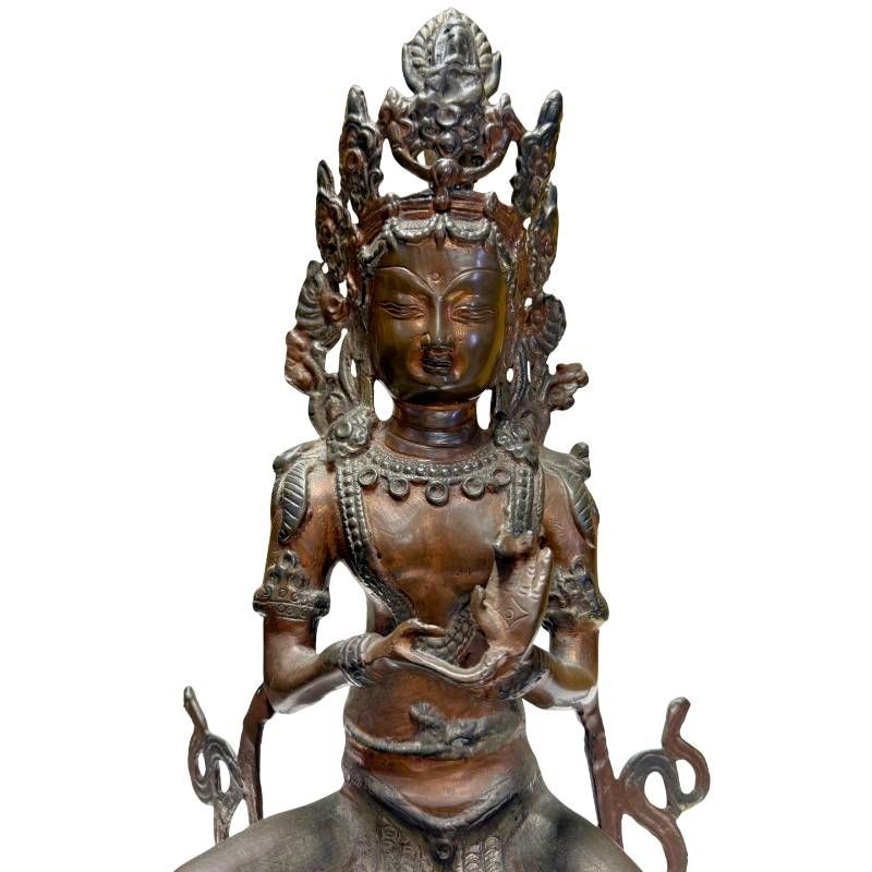 Himalayan Tara statue made of bronze copper alloy with an old patina