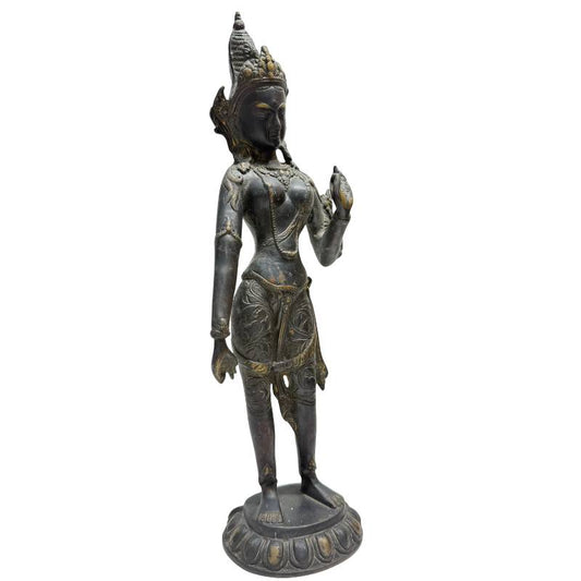 Front view of the bronze Tara Bodhisattva on a lotus base.