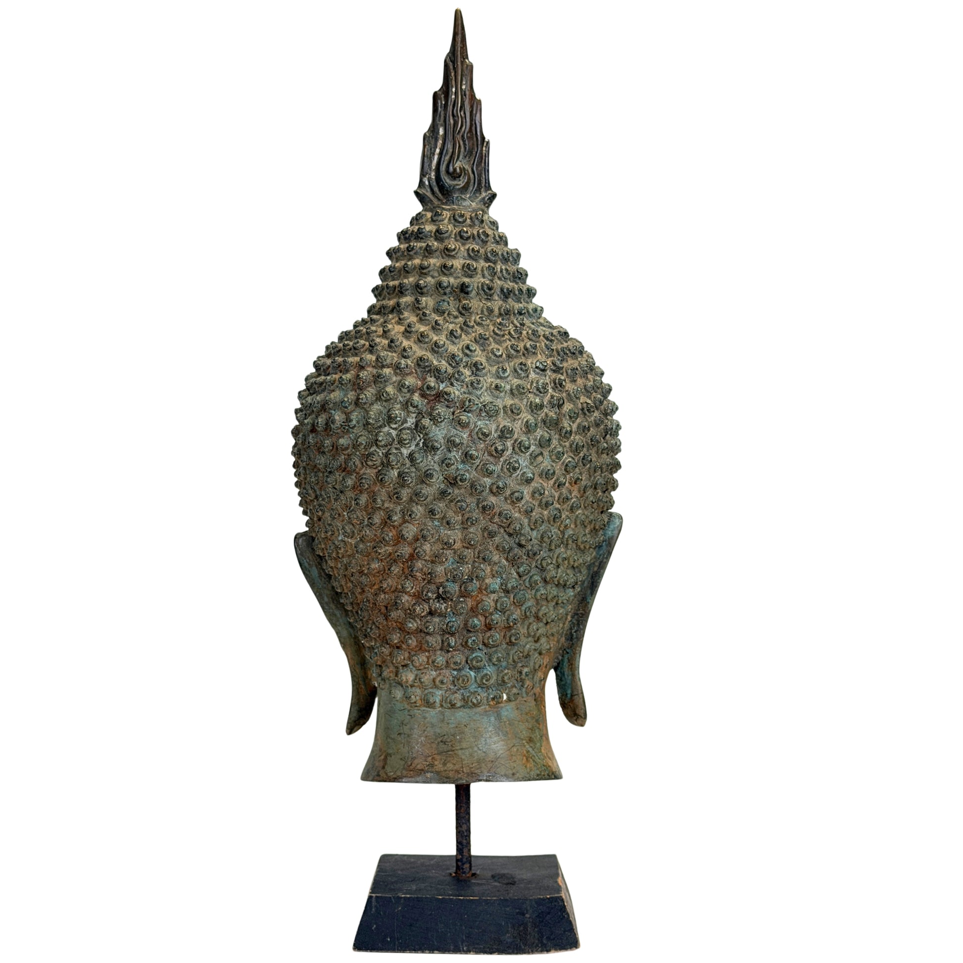 Antique Thai Buddha with high ushnisha and characteristic flame