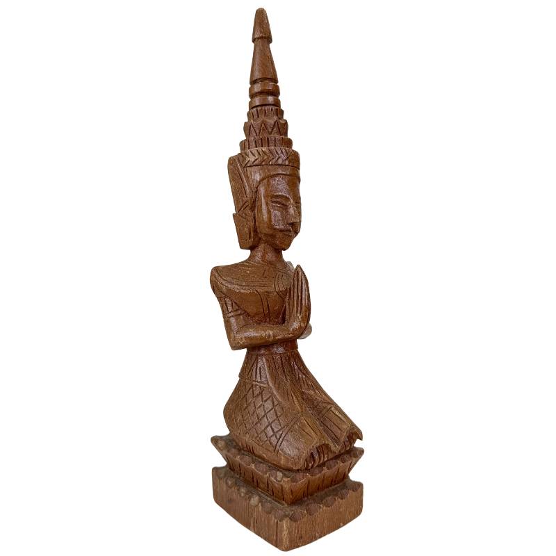 Antique wooden Thai figures set with a devotional appearance