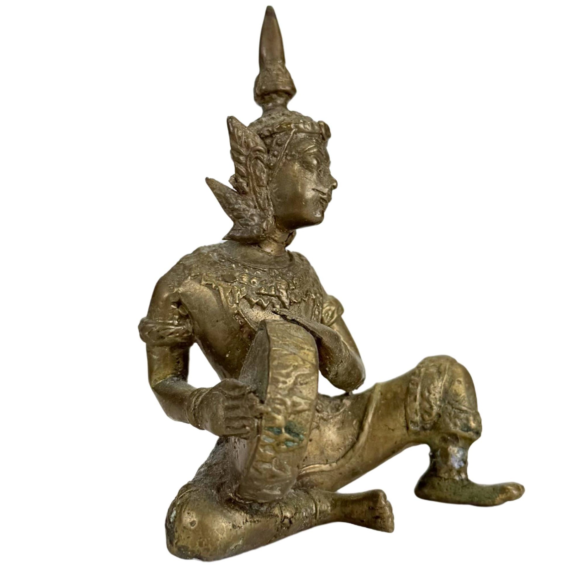 Set of three old Thai bronze musician figures from temple tradition