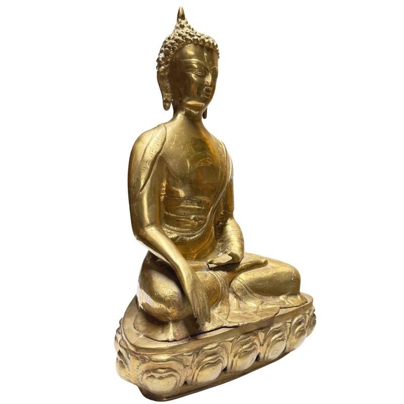 Antique Tibetan Buddha of fire-gilded bronze on a lotus base