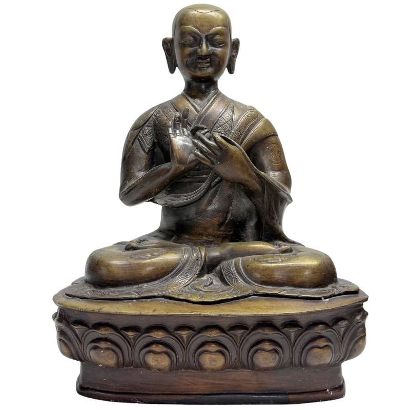 Antique Tibetan lama in bronze on a lotus base