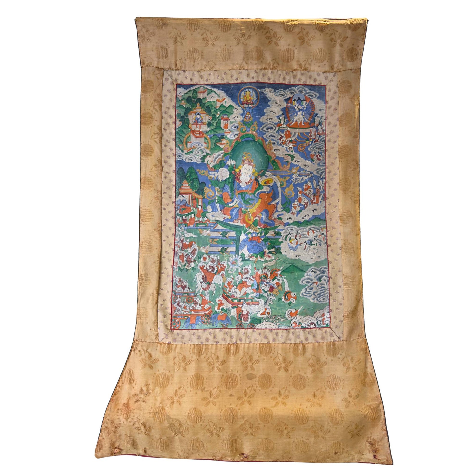 Antique hand-painted Tibetan thangka with Yab-Yum iconography in a silk brocade frame