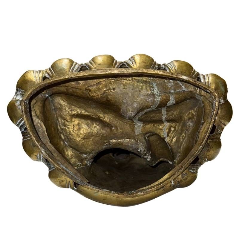 Antique fire-gilded Buddha on a lotus seat with traditional shape
