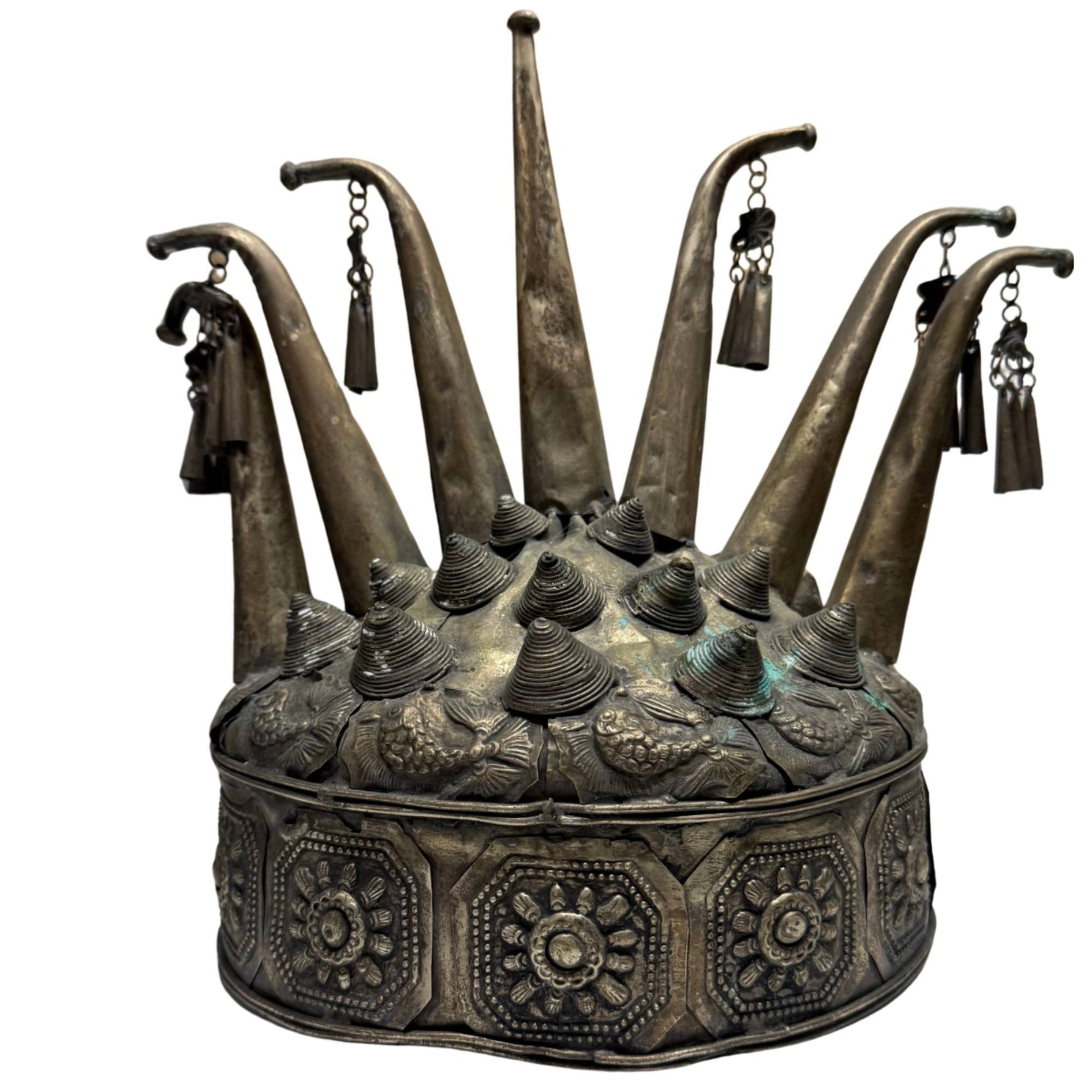 Antique Southeast Asian shaman's crown, hand-beaten metal with floral panels, bells, and ritual symbolism
