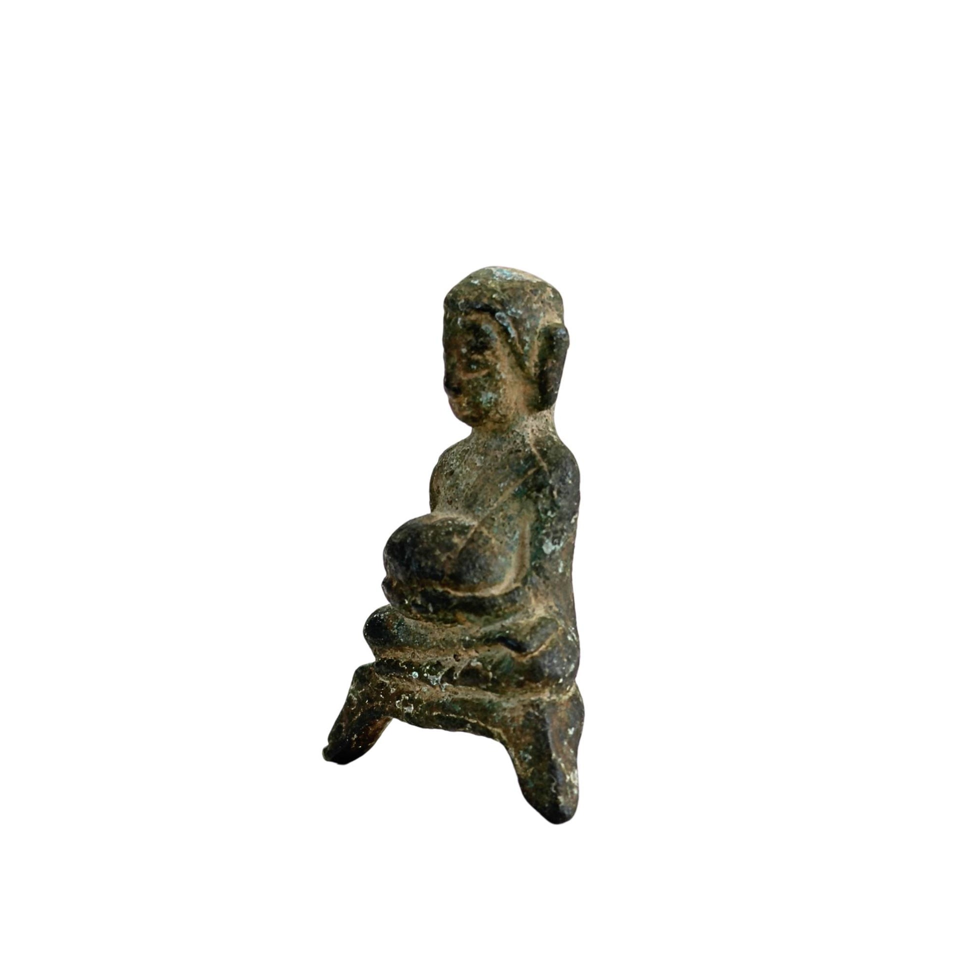 Authentic antique Buddha figurine with a historical appearance
