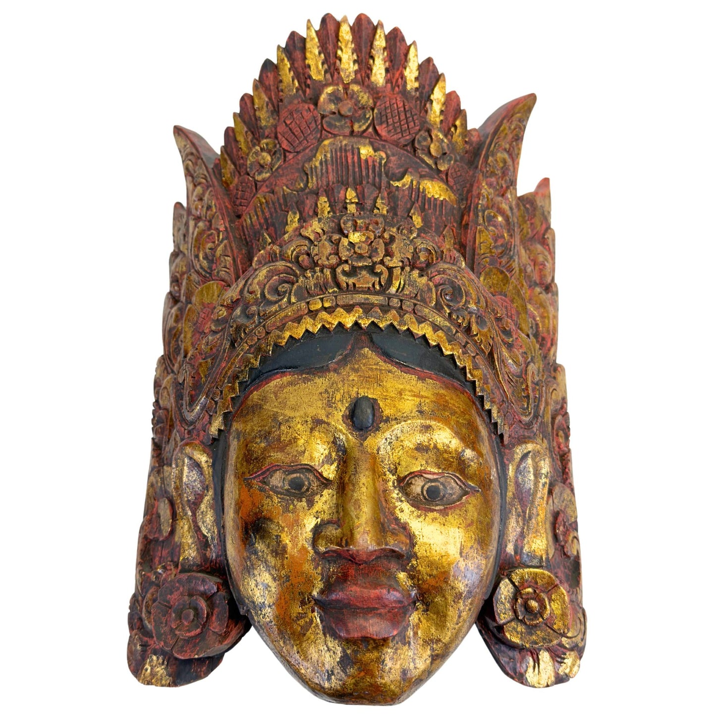 Close-up of the face of the Dewi Sinta mask with the traditional gold layer and peaceful smile, designed to bring prosperity and harmony.
