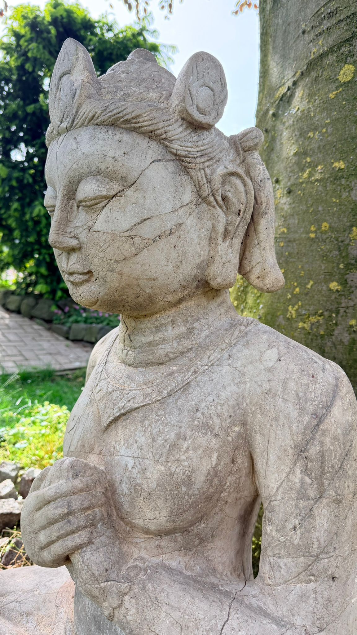 Authentic Indonesian temple statue with natural weathering and old patina