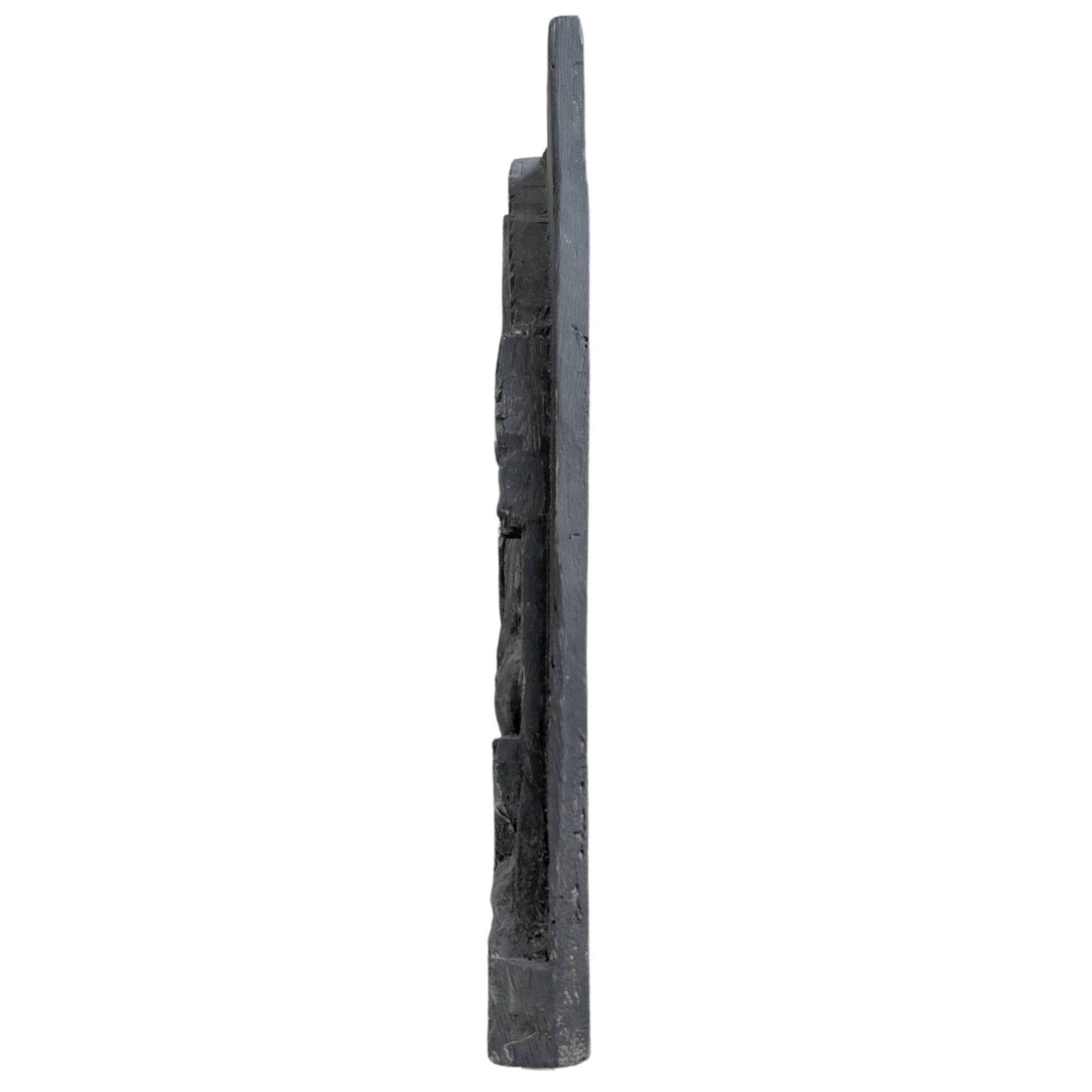 Close-up of a deep natural shrinkage crack and historical patina on old temple wood.