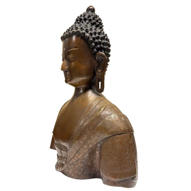 Authentic Nepalese Buddha bust with a peaceful expression