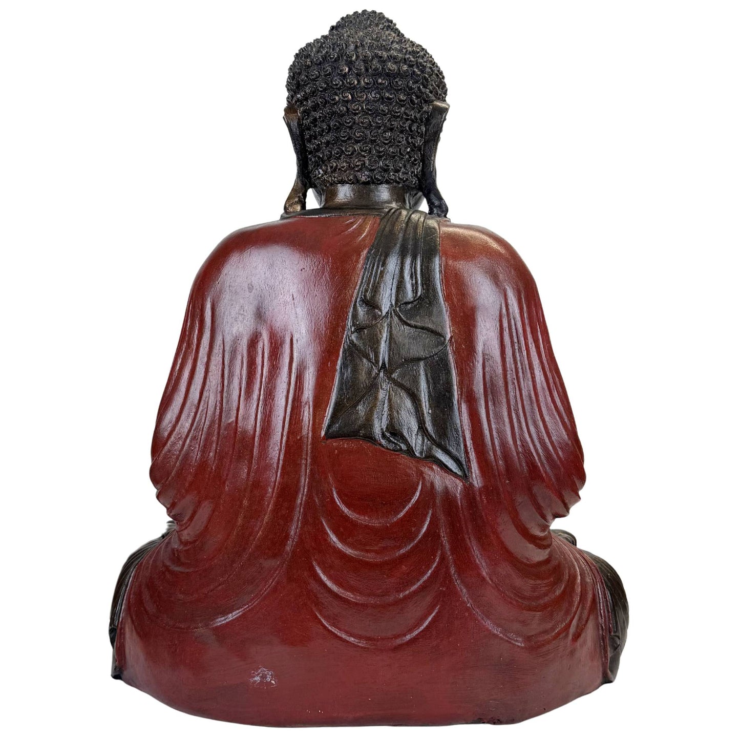 Large Asian Buddha sculpture made of resin with fine details and a meditative atmosphere