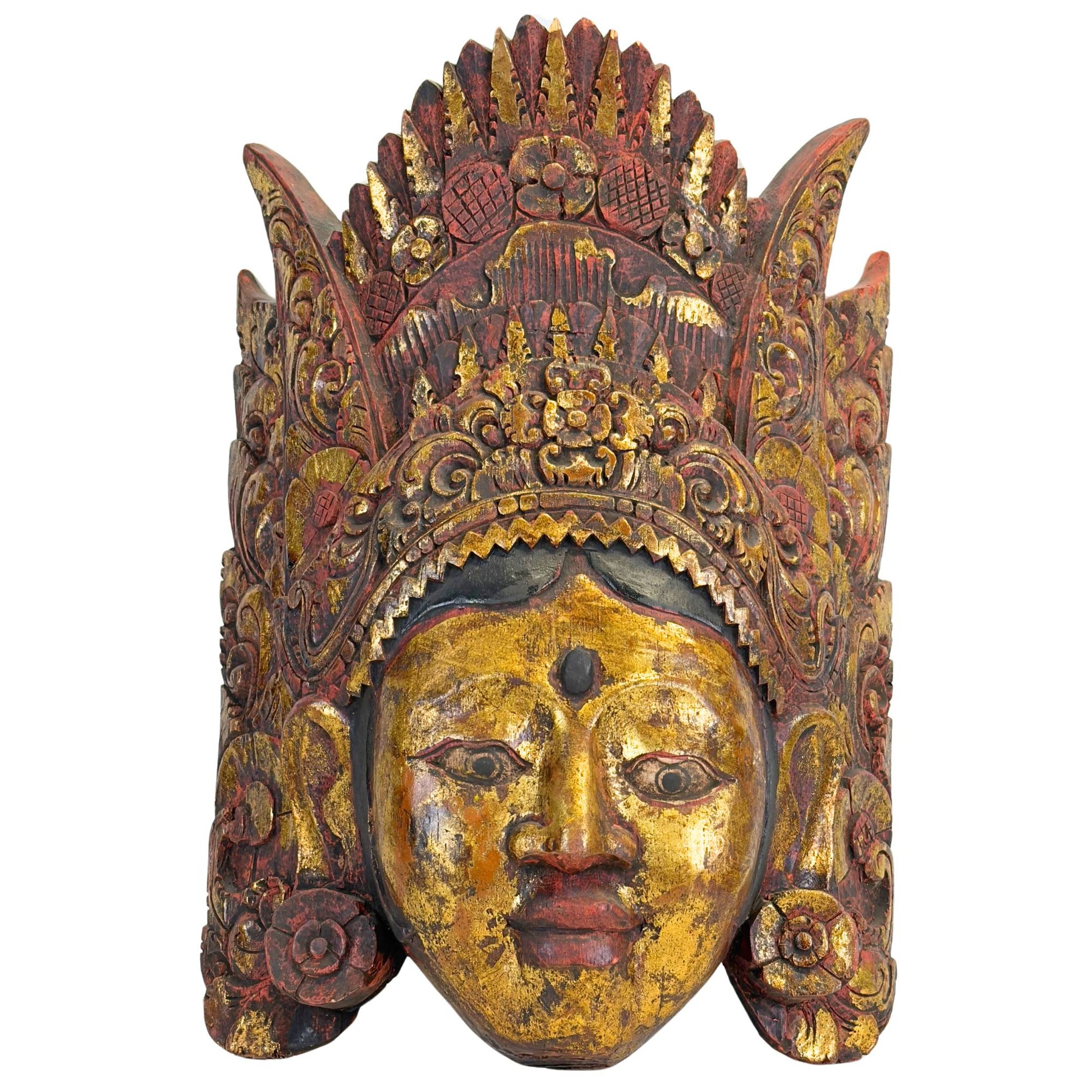 Detailed front view of the hand-carved Balinese dance mask of Dewi Sinta, showing the serene facial features and the refined, layered crown.