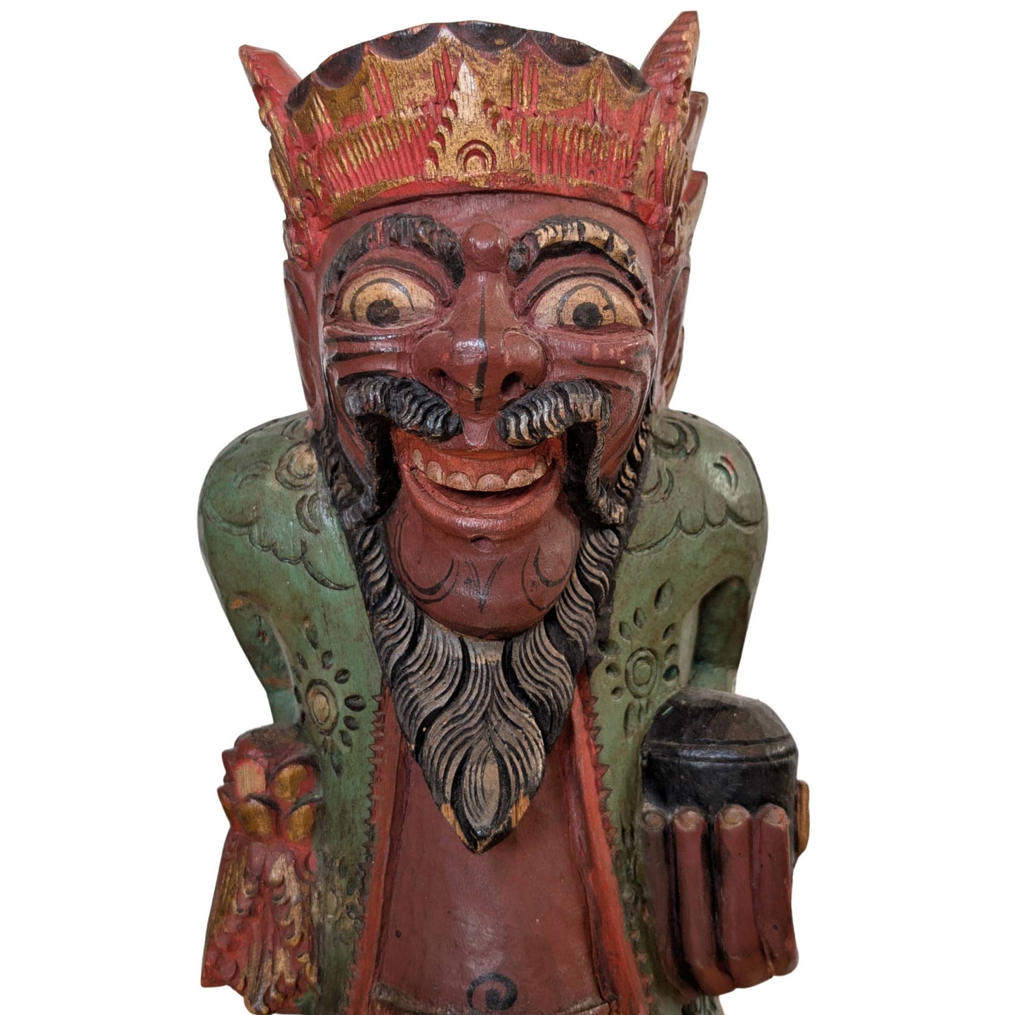 The Balinese temple guardian presented as a decorative element on a sideboard.
